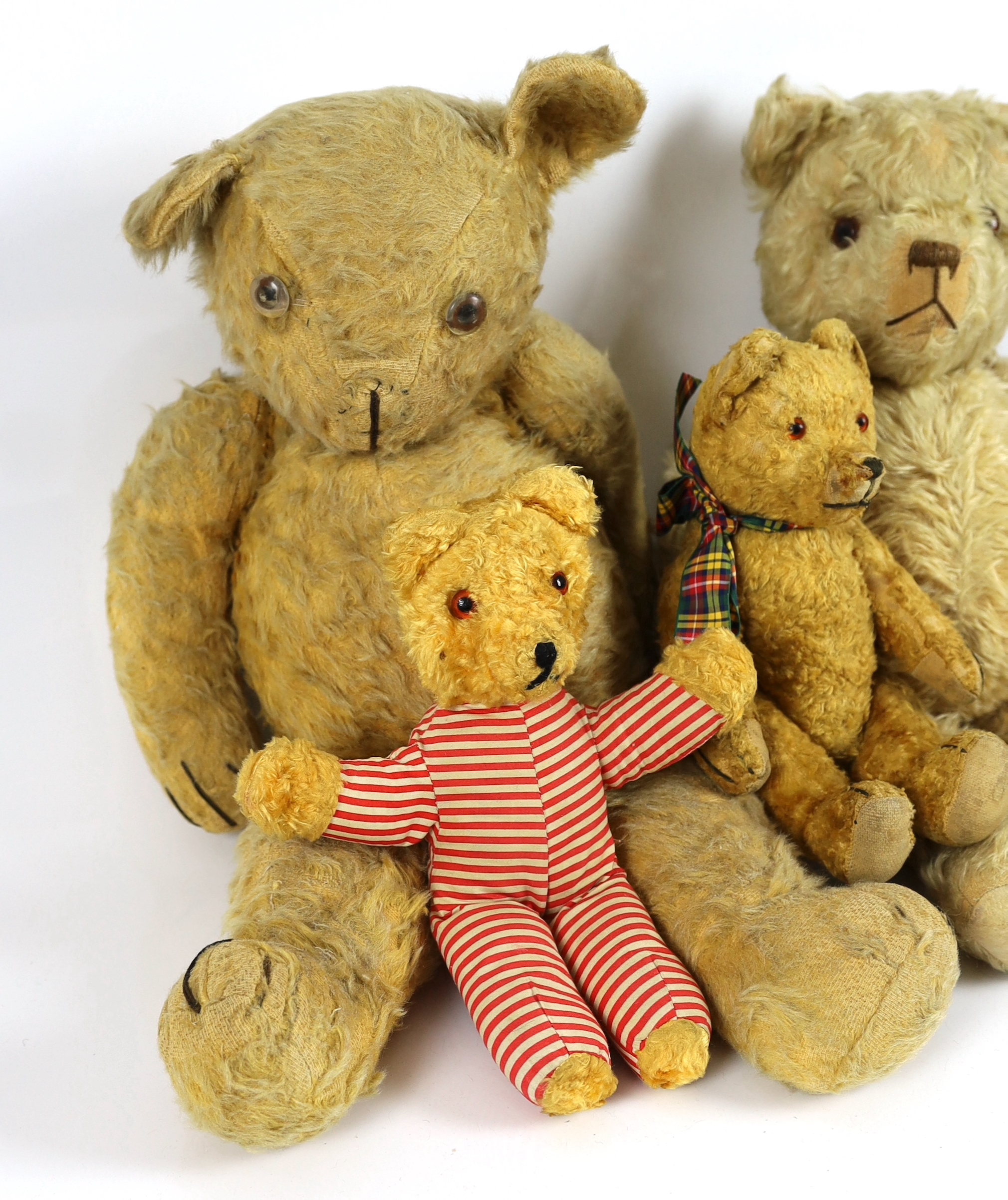 A light plush bear, and three others, 52cm (4)